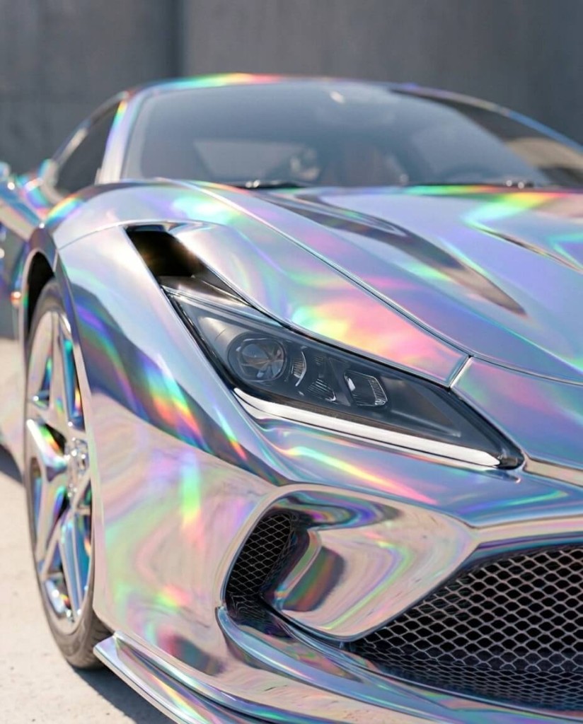 Automotive detail, holographic paint Sports car front quarter in iridescent chrome, rainbow reflections on body and wheel